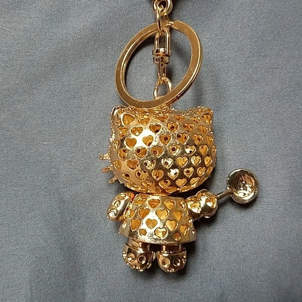 Hello Kitty Orange Lollipop Bejeweled Swivel Keychain